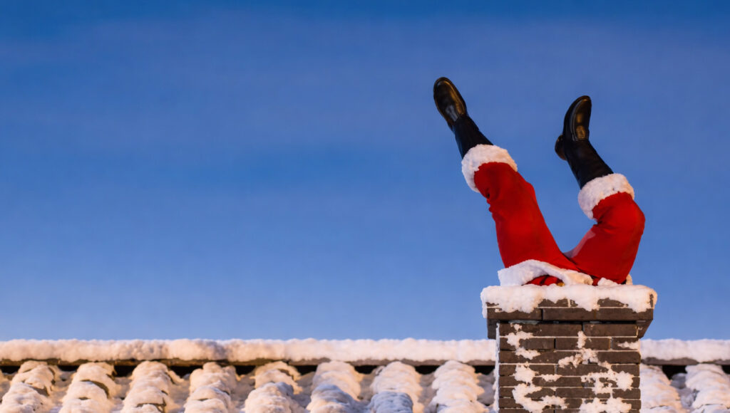 Tomte sitter fast i skorsten